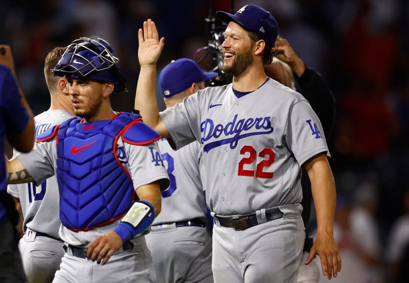 Clayton Kershaw #22 of the Los Angeles Dodgers celebrates a 9-1 win against the Los Angeles Angels at Angel Stadium of Anaheim on July 15, 2022 in Anaheim, California.