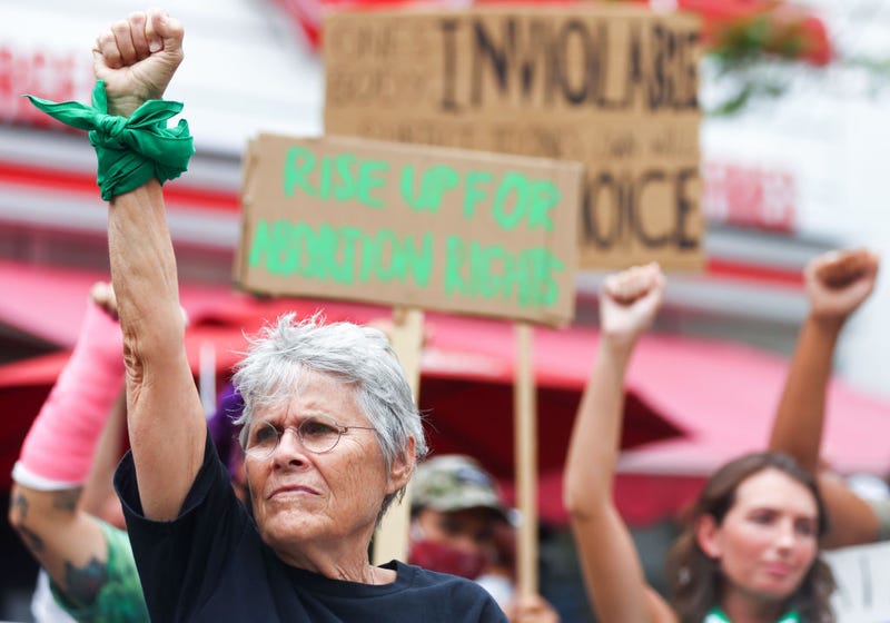 Abortion-rights activists demonstrate outside a Planned Parenthood clinic as they safeguard the clinic from a possible protest by a far-right group on July 16, 2022 in Santa Monica, California.
