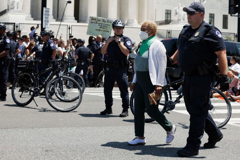 Rep. Barbara Lee (D-CA) is detained by U.S. Capitol Police Officers after participating in a sit in with activists from Center for Popular Democracy Action (CPDA) in front of the U.S. Supreme Court Building on July 19, 2022, in Washington, DC. The CPDA held the protest with House Democrats in support of abortion rights.