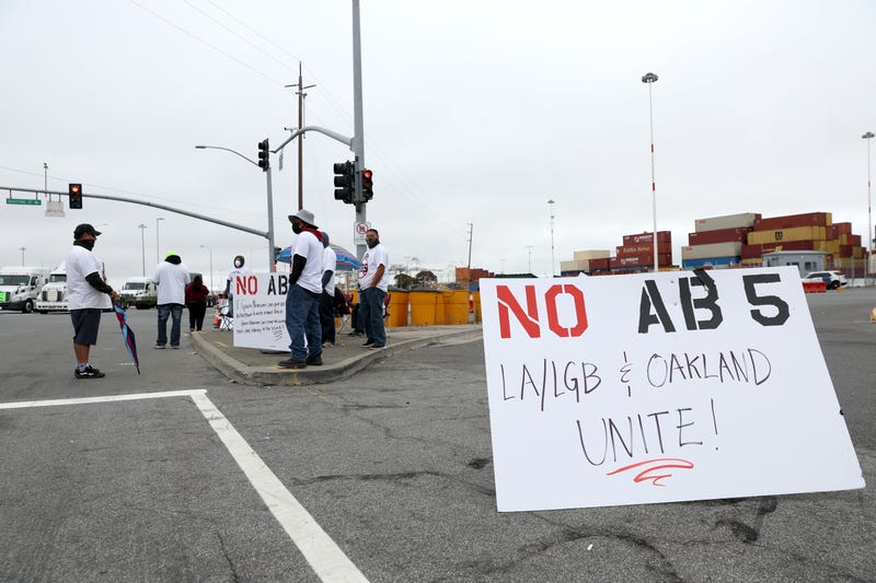 Truck drivers block the entrance to a container terminal at the Port of Oakland on July 21, 2022 in Oakland, California.