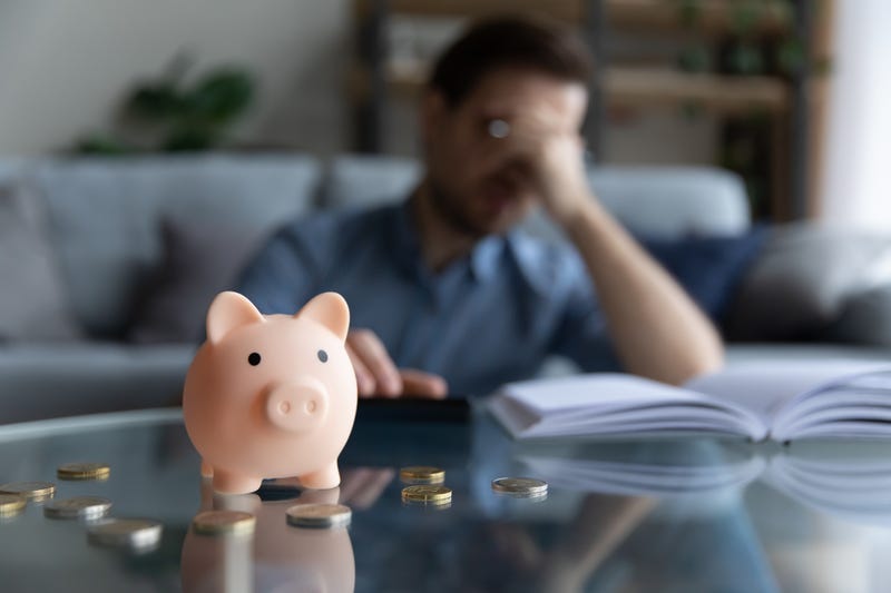 Single man setting his budget. 