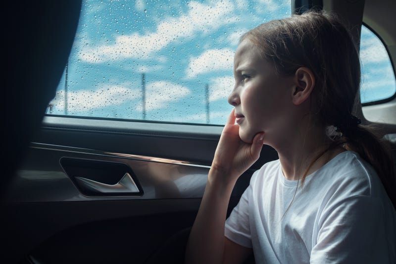 Boy left alone in vehicle