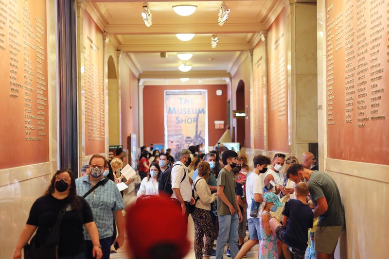People visit the American Museum of Natural History on July 27, 2022