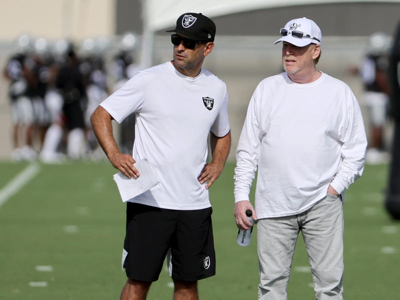 Raiders GM Dave Ziegler observes his team with owner Mark Davis