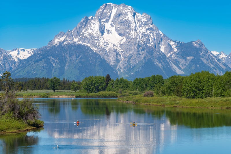 The mountain range of Grand Teton National Park is photographed during a morning with the peaks' reflections in Snake River where Wesley Dopkins, 43, of St. Paul, was last seen paddling on June 15, 2024.