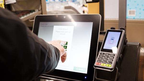 Man says he was asked to add a tip after buying a bottle of water at a self-checkout machine