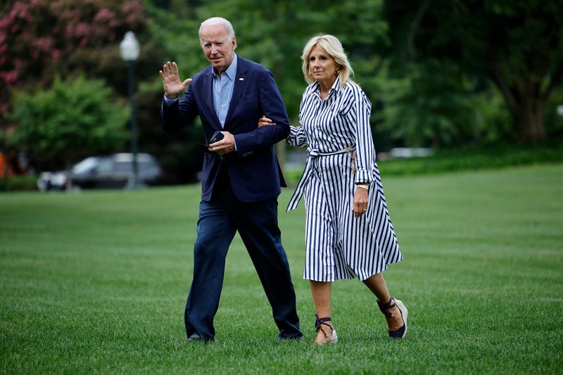 WASHINGTON, DC - AUGUST 08: U.S. President Joe Biden and first lady Jill Biden walk across the South Lawn as they return to the White House on August 08, 2022 in Washington, DC. The Bidens spent the weekend at their home in Rehoboth Beach, Delaware before traveling to Kentucky today to survey flood damage.