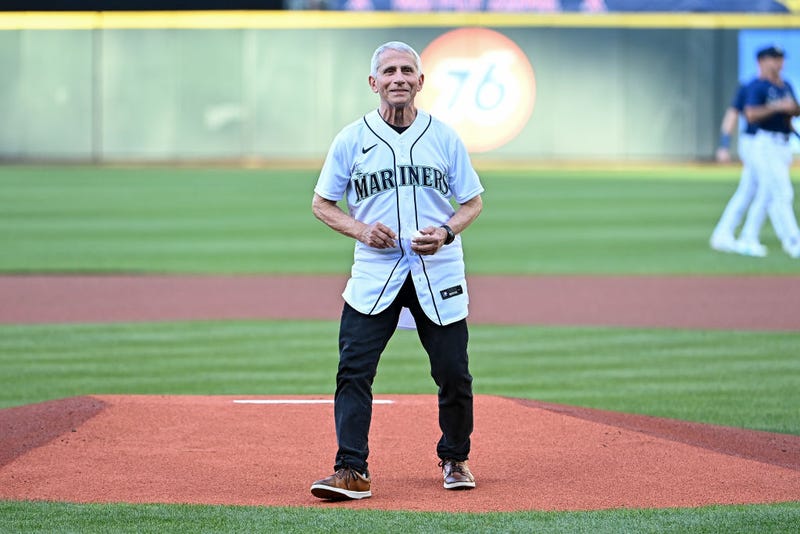  Dr. Anthony Fauci, director of the National Institute of Allergy and Infectious Diseases and chief medical advisor to the U.S. president, throws out the ceremonial first pitch before the game between the Seattle Mariners and the New York Yankees at T-Mobile Park on August 09, 2022 in Seattle, Washington. (Photo by Alika Jenner/Getty Images)