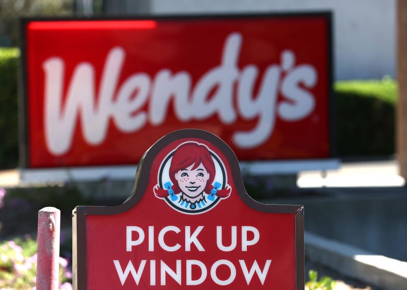 A sign is posted in front of a Wendy's restaurant on August 10, 2022 in Petaluma, California.