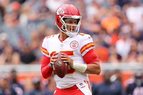 Patrick Mahomes models the Chiefs white uniform tops. 