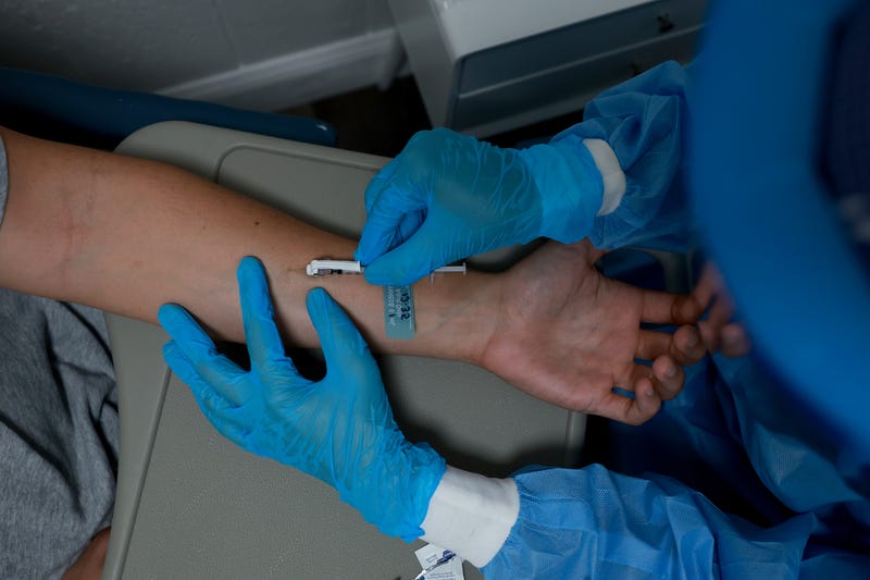 A nurse administers an intradermal monkeypox vaccine.