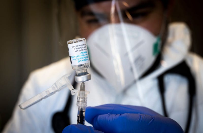 Mobile Operations Manager Parsia Jahanbani prepares a dose of the monkeypox vaccine at Families Together of Orange County in Tustin, CA on Tuesday, August 16, 2022. The Jynneos vaccine consists of two doses administered 28 days apart.