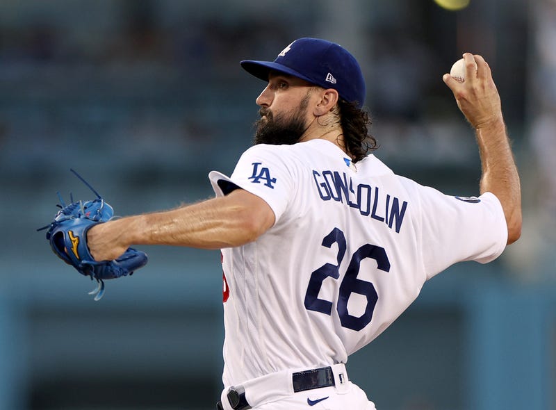 Tony Gonselin #26 of the Los Angeles Dodgers pitches against the Milwaukee Brewers during the first inning at Dodger Stadium on August 23, 2022 in Los Angeles, California.