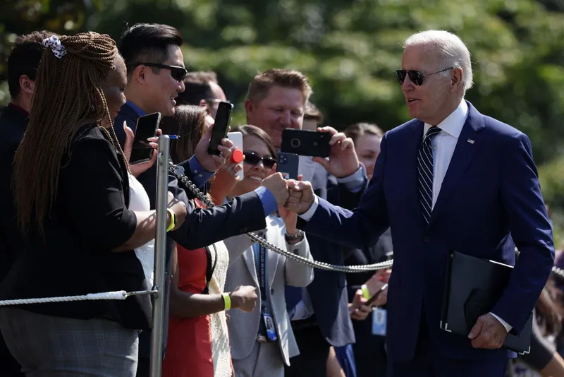 U.S. President Joe Biden greets guest after he returned to the White House August 24, 2022 in Washington, DC. President Biden has returned from Rehoboth Beach in Delaware.