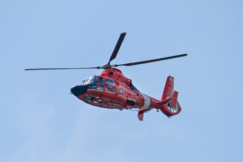 A Coast Guard helicopter flies over Atlantic City, N.J.