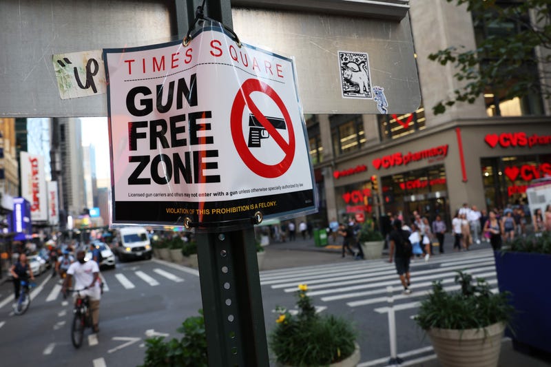 A "Gun Free Zone" sign is seen posted on 40th Street and Broadway on Aug. 31, 2022 in New York City