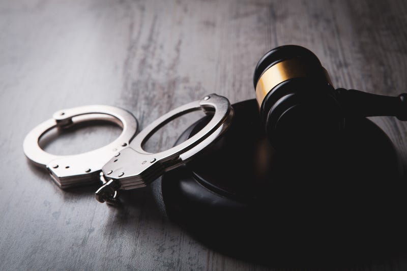 Handcuffs and gavel. 