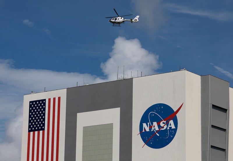A NASA helicopter flies past the Vehicle Assembly Building after the scrubbing of a launch attempt for the Artemis I rocket from launch pad 39B at Kennedy Space Center on September 03, 2022 in Cape Canaveral, Florida.