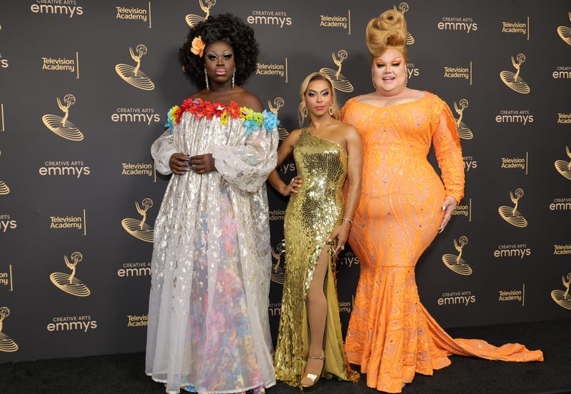 Bob The Drag Queen, Shangela, and Eureka attend an event. they wear long formal dresses