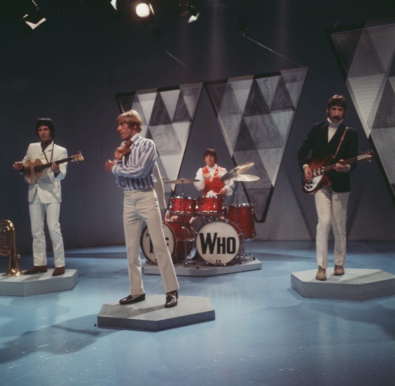 British rock band The Who (British bass player John Entwistle (1944-2002), British singer, musician and actor Roger Daltrey, British drummer Keith Moon (1946-1978), and British singer, songwriter and guitarist Pete Townshend) performing on 'A Whole Scene Going', at BBC Television Centre in London, England, 5th January 1966.