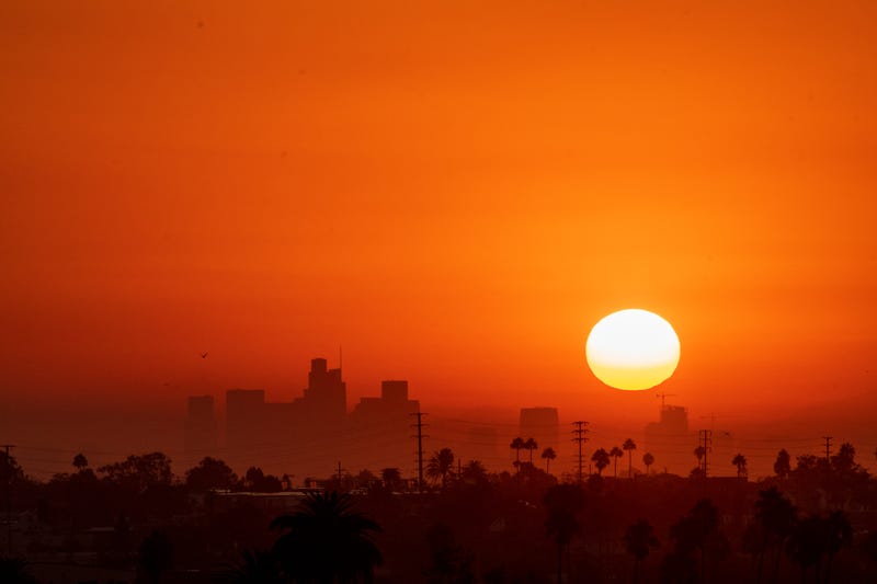 sun rises over los angeles