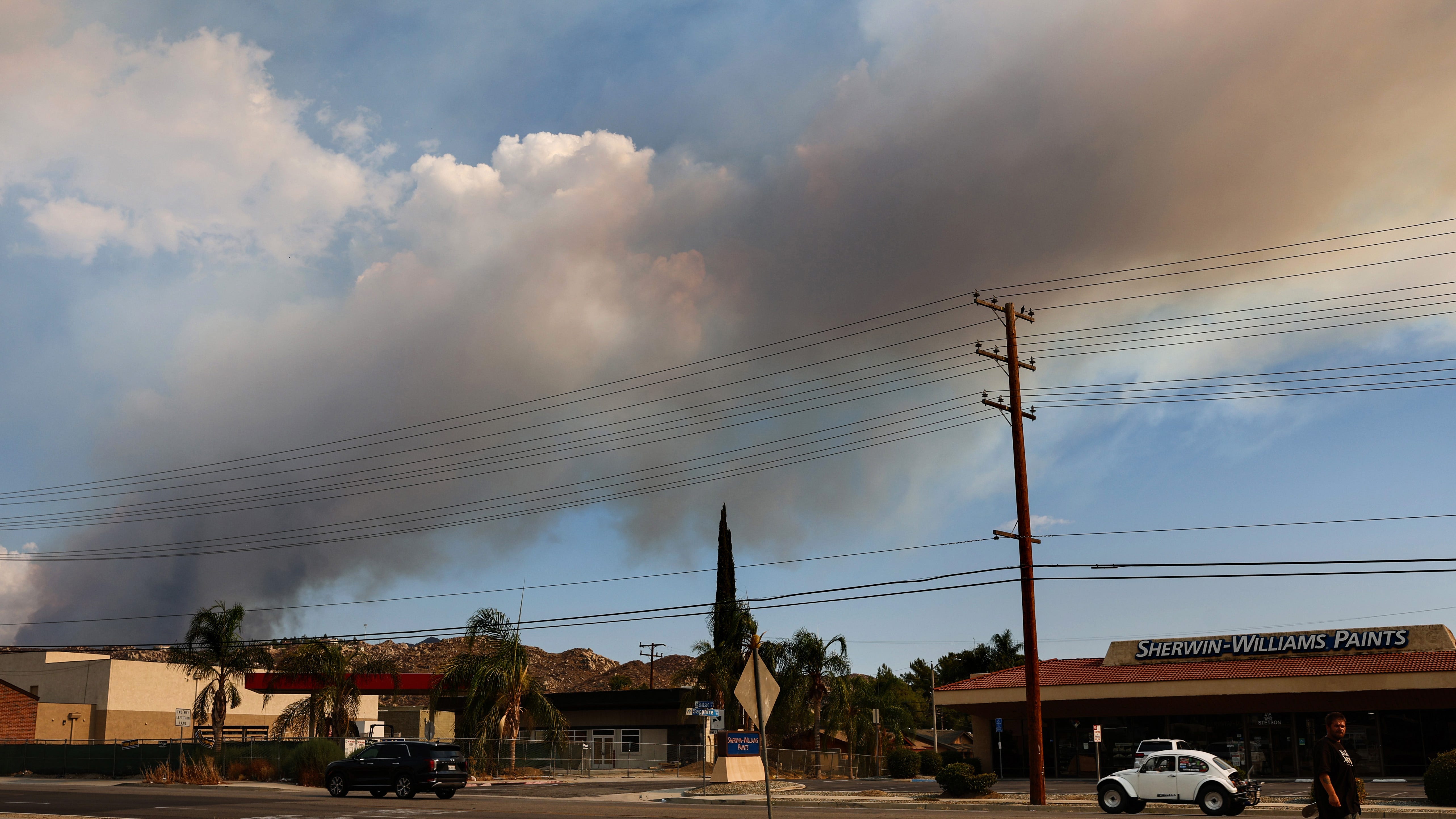 Tropical rain helps firefighters battle Hemet-area brushfire