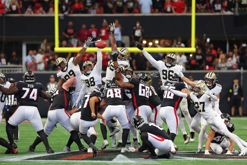 New Orleans Saints defensive lineman Payton Turner blocks a field goal