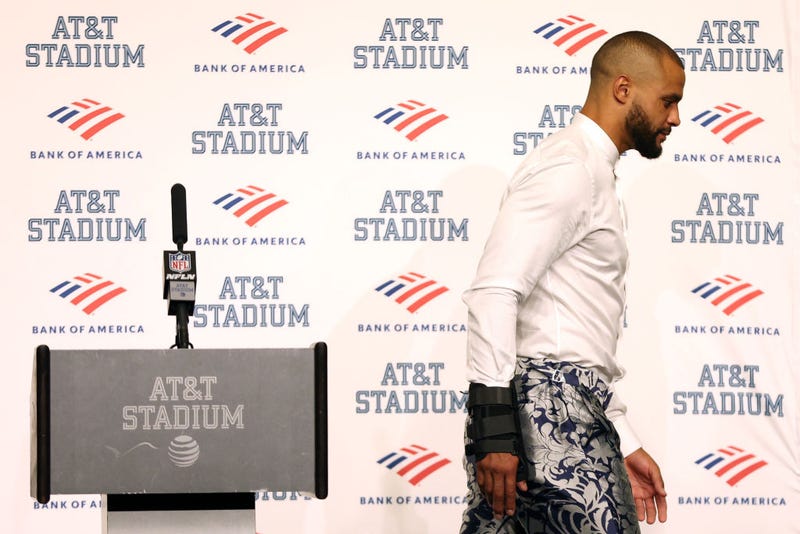 Quarterback Dak Prescott #4 of the Dallas Cowboys walks away from the podium during the post-game press conference after a 19-3 loss against the Tampa Bay Buccaneers at AT&T Stadium on September 11, 2022 in Arlington, Texas. Prescott left the game with a hand injury in the fourth quarter.