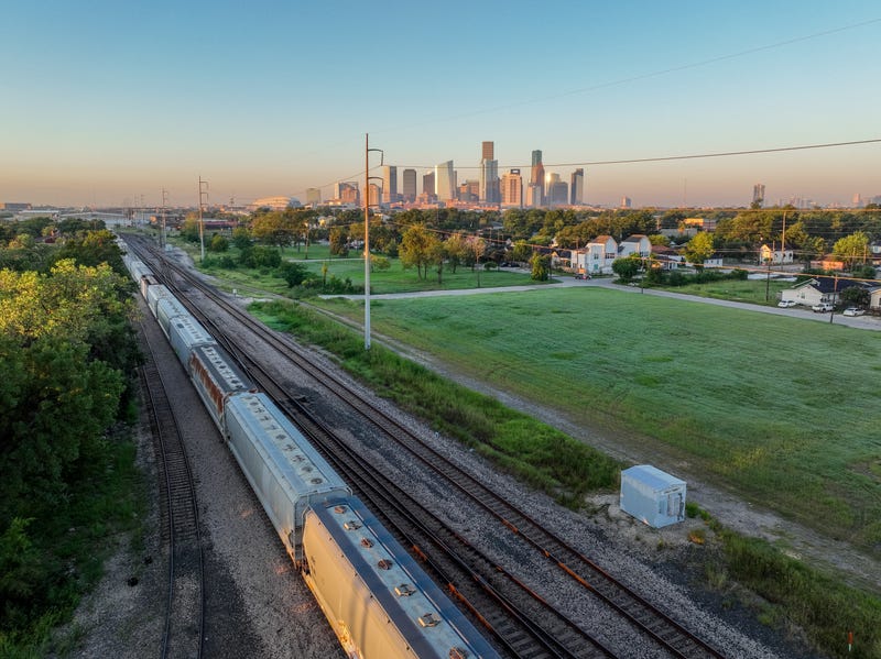 In an aerial view, a freight train is seen traveling through Houston on September 14, 2022, in Houston, Texas.
