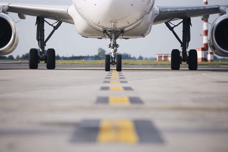 Front view of plane at airport.