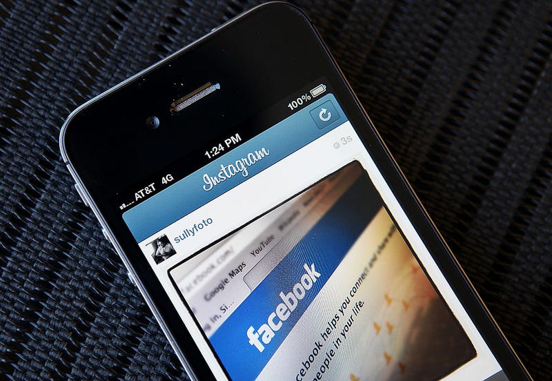 In this photo illustration, an Instagram photo of the Facebook website app is seen on an Apple iPhone on April 9, 2012 in New York City. Facebook Inc. is acquiring photo-sharing app Instagram for approx. $1 billion.