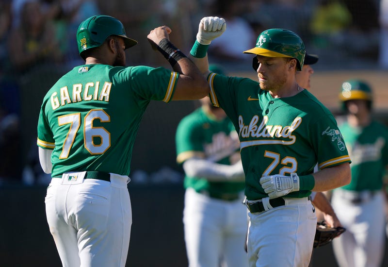 Dermis Garcia #76 and Conner Capel #72 of the Oakland Athletics celebrates after Capel hit a three-run home run against the New York Mets 