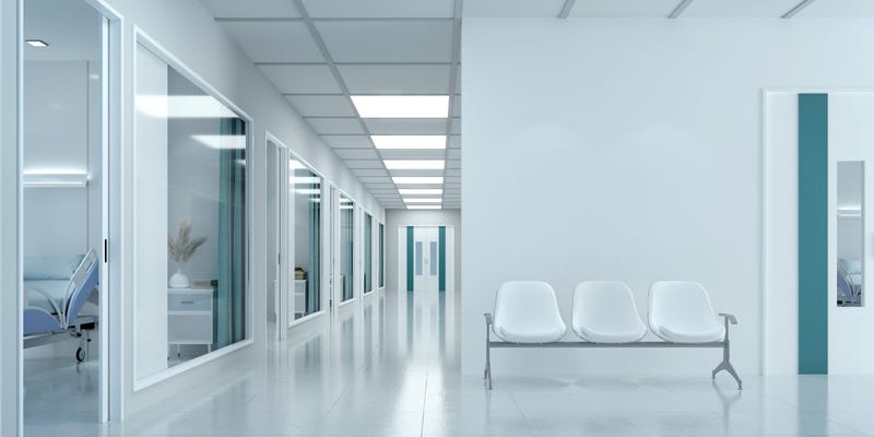 Hospital waiting room next to rooms.