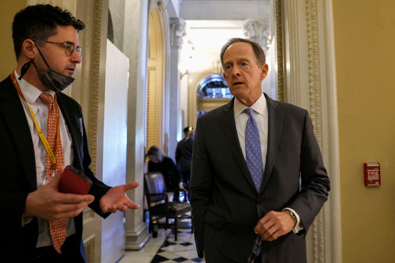 Sen. Pat Toomey (R-PA) speaks with reporters before attending a policy luncheon with Senate Republicans