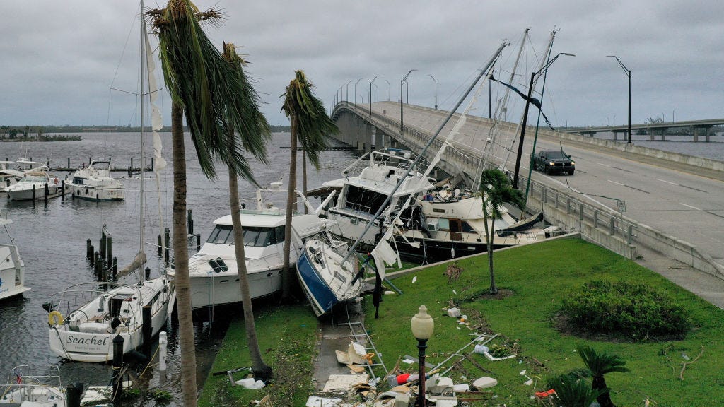 Man swims half a mile in hurricane to save mom