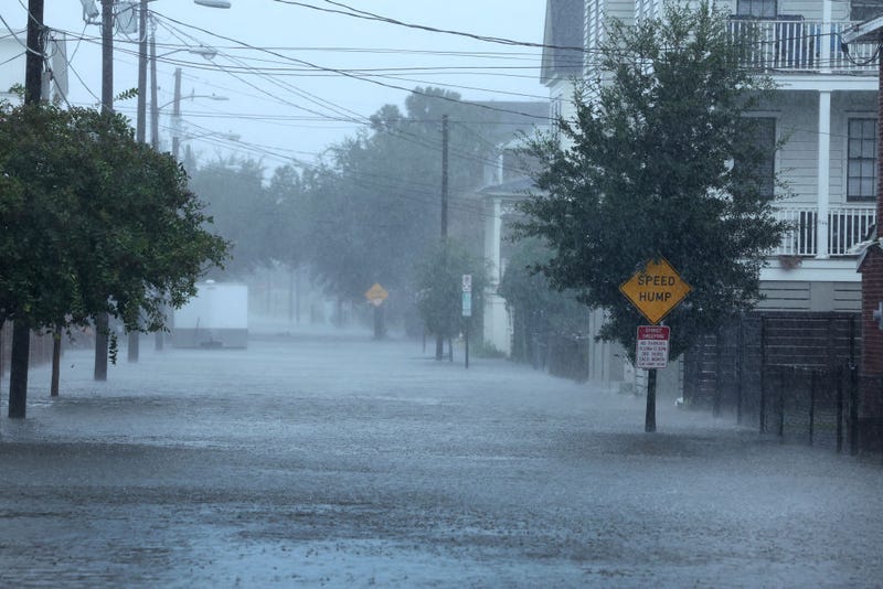 Rain from Hurricane Ian floods a street on September 30, 2022 in Charleston, South Carolina