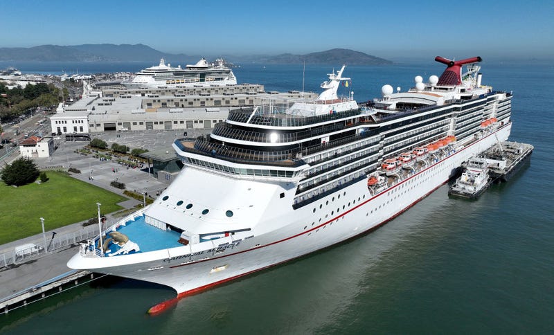 In an aerial view, the Carnival Miracle cruise ship operated by Carnival Cruise Lines sits docked at Pier 27 on September 30, 2022 in San Francisco, California. Carnival reported third-quarter earnings that fell short of analyst expectations with revenues of $4.31 billion, up from $546 million one year ago but under the estimate of $4.90 billion. Shares of Carnival fell 20 percent when the company predicted a loss in the next quarter. (Photo by Justin Sullivan/Getty Images)