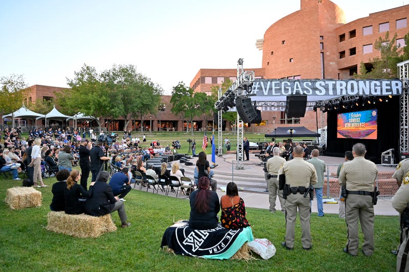 People listen during the 1 October Sunrise Remembrance ceremony, held on the fifth anniversary of the deadliest mass shooting in modern U.S. history, at the Clark County Government Center Amphitheater on October 01, 2022 in Las Vegas, Nevada.