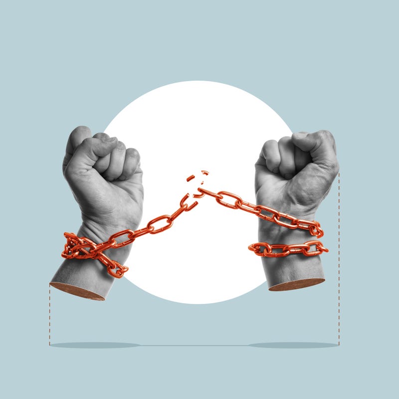Hands with broken chains, showing freedom from abduction. 
