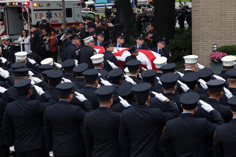 The casket of FDNY Lt. Alison Russo-Elling arrives at the Tilles Center for Performing Arts on Long Island on Oct 5, 2022