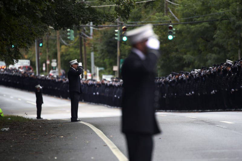 Hundreds of firefighters, EMS workers and other first responders gather at the Tilles Center for Performing Arts in in Brookville, New York, on Oct. 5, 2022