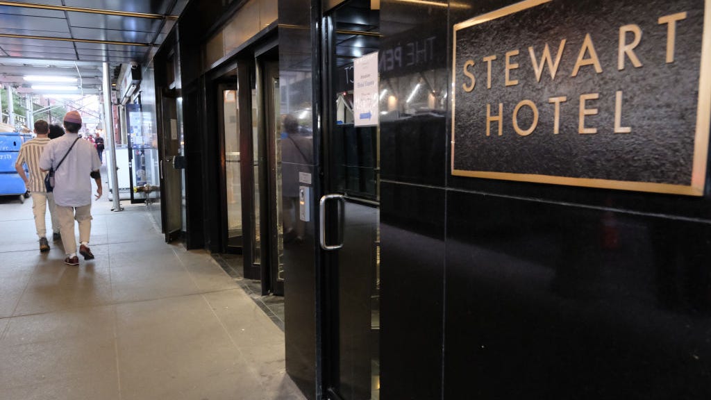 Chaos at NYC hotel-turned-shelter ends with 2 brothers stabbed by security worker