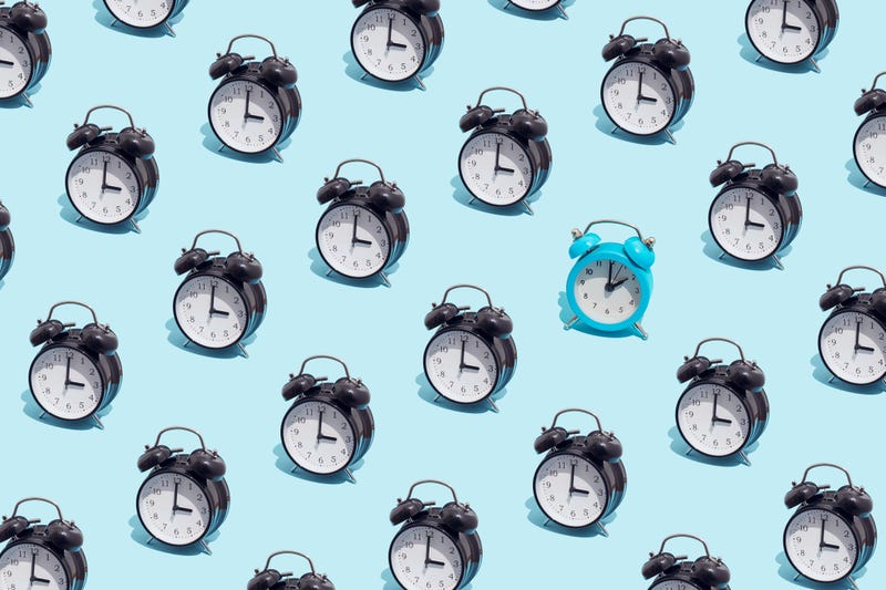 Clocks on a blue background.