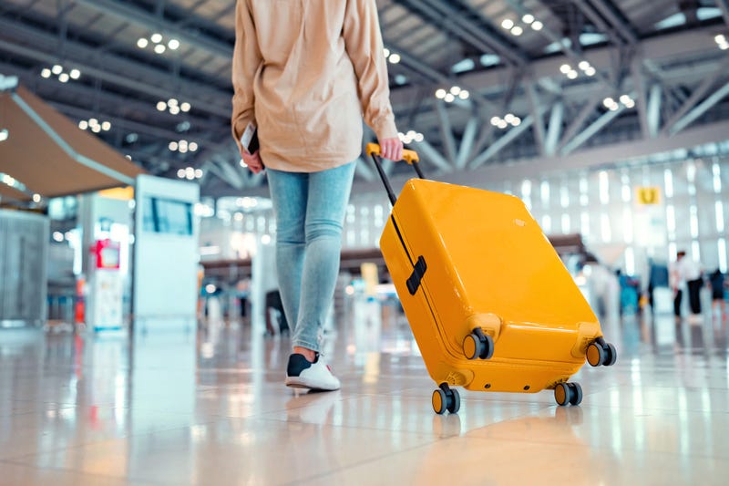Young traveler in an airport. 