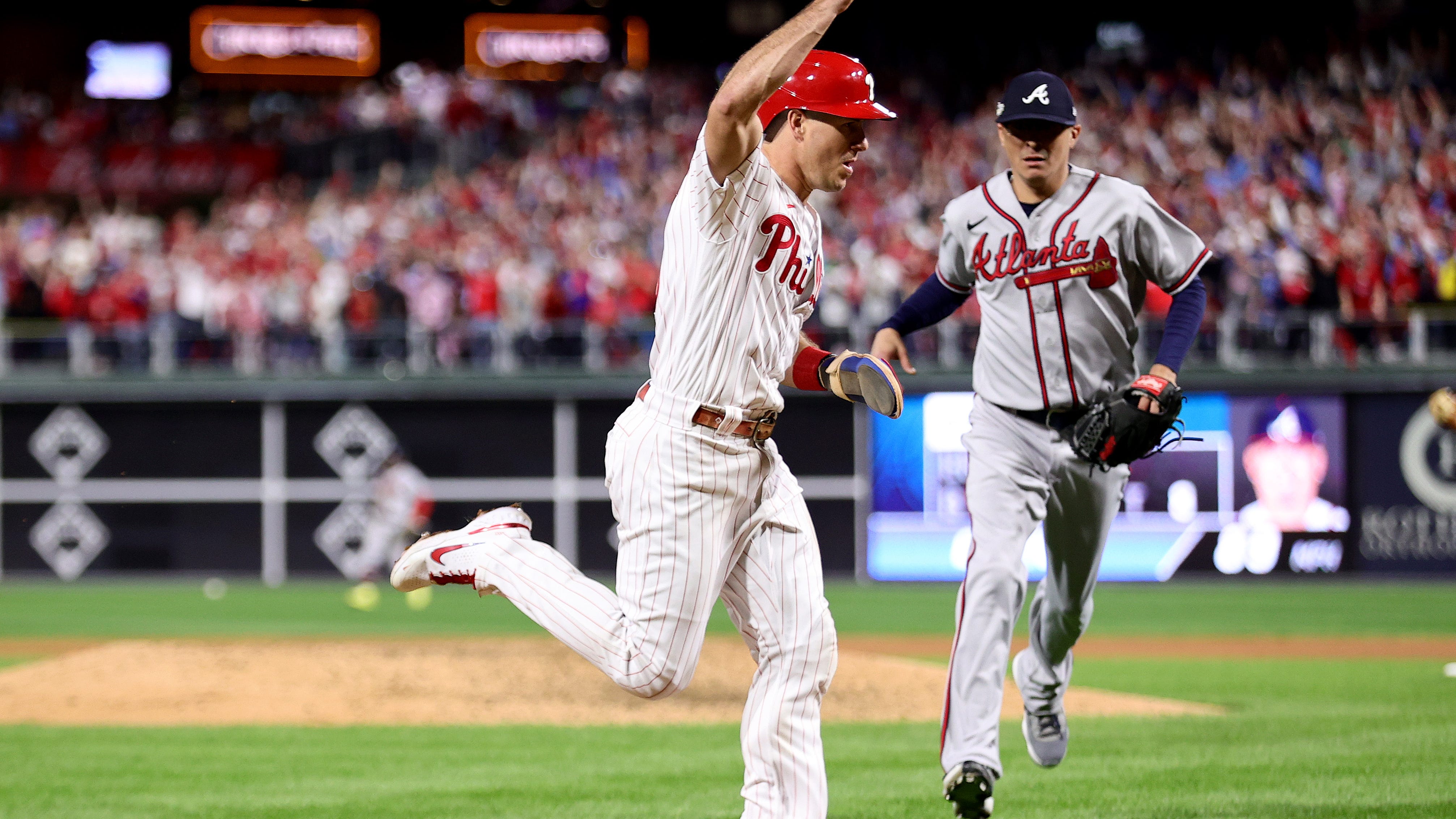 WATCH: J.T. Realmuto hits first playoff inside-the-park home run by a catcher in MLB history