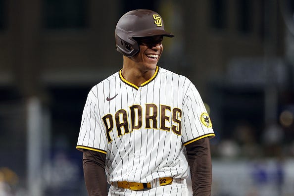 Juan Soto models the Padres home uniforms.