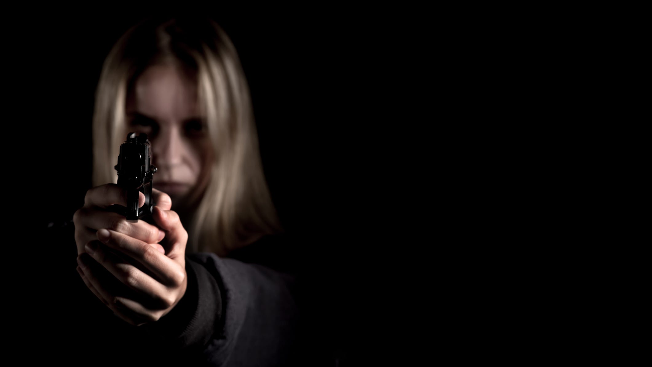 Woman kills carjacker with his own gun