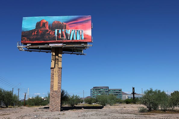 Billboard in desert with Super Bowl LVII logo