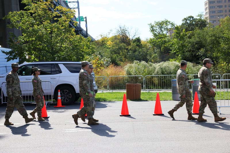 Members of the National Guard arrive to the Randall's Island Humanitarian Emergency Response and Relief Center on Oct. 18, 2022