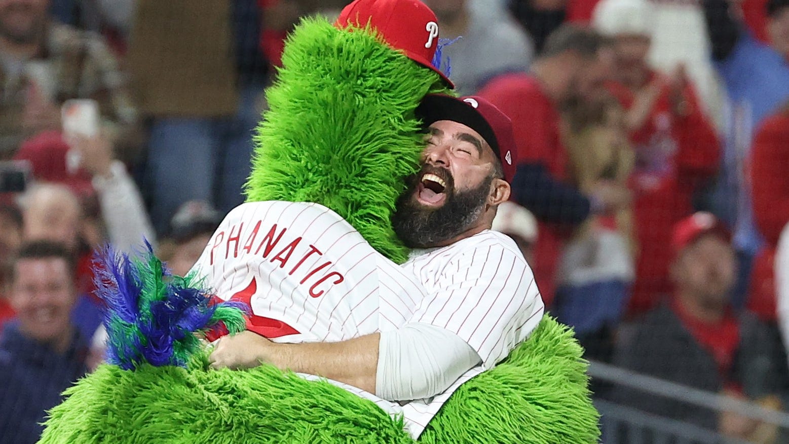 A beer chug and a hug: Jason Kelce hypes up Phillies crowd with Phanatic